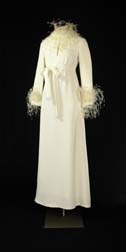 white gown with ostrich feather cuffs